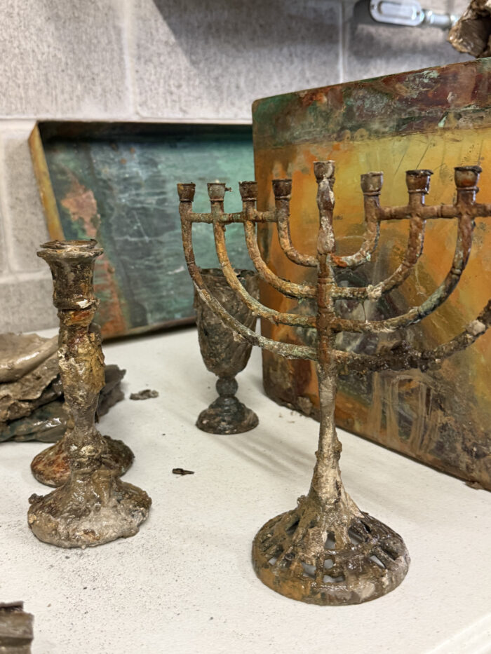 July 25 - Contents include a Hanukkiah, Shabbat candlesticks, and a kiddish cup
