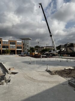Steel delivery for the new building.